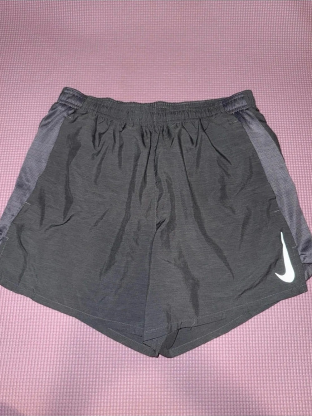 Nike Women's Gray Athletic Shorts with White Swoosh Accent